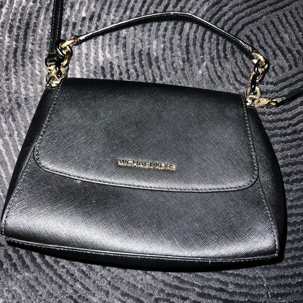 Michael Kors Black and Gold Crossbody Bag with Flap Closure and Adjustable Strap